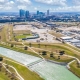 Lake Flato and HR&A Advisors have revised plans to reroute the Trinity River, creating a mixed-use island in Fort Worth, TX.