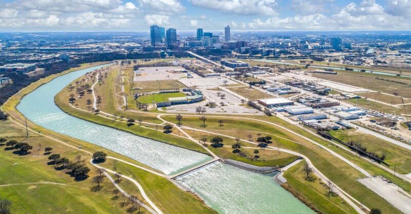 Lake Flato and HR&A Advisors have revised plans to reroute the Trinity River, creating a mixed-use island in Fort Worth, TX.